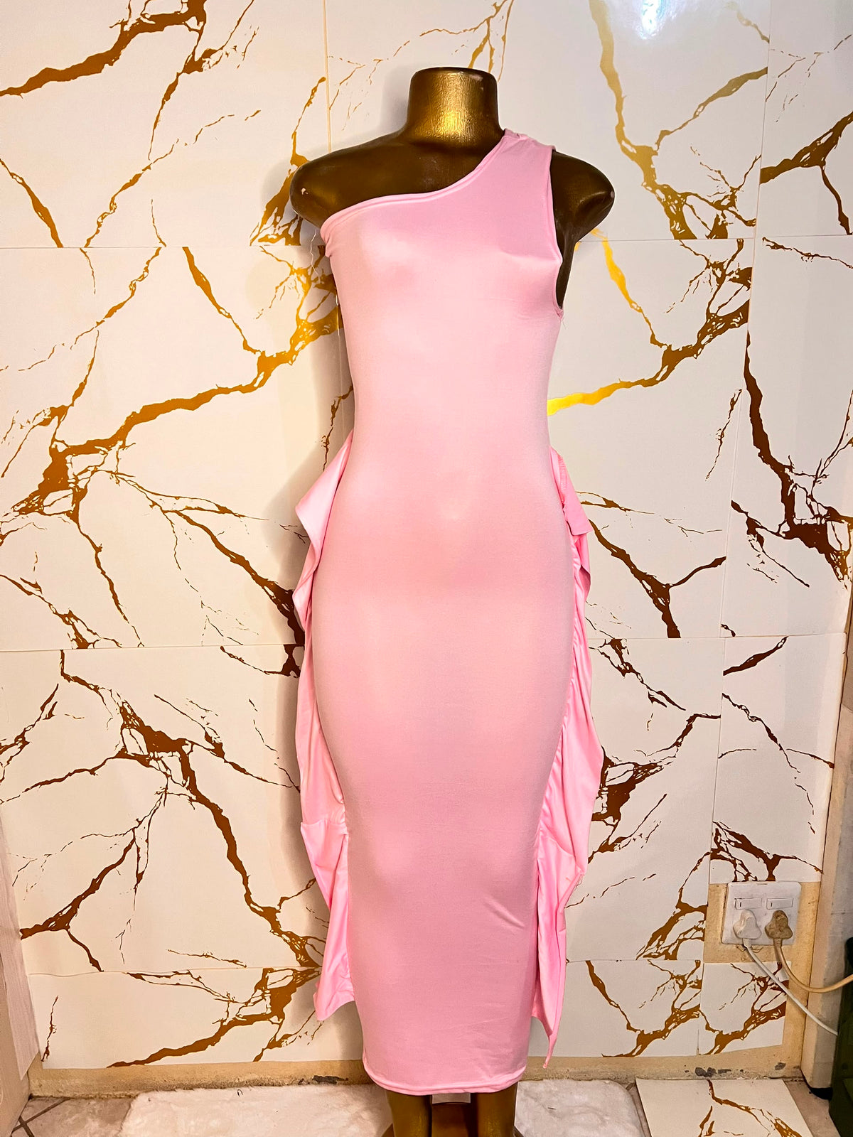 A light pink one-shoulder bodycon dress 