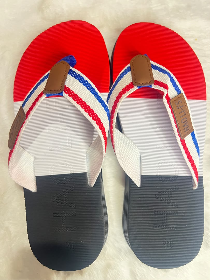Red, white, and navy blue flip-flop sandals