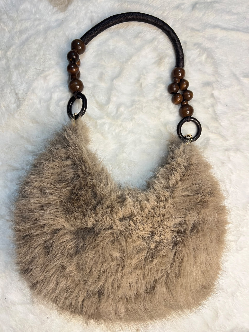 Brown fur handbags