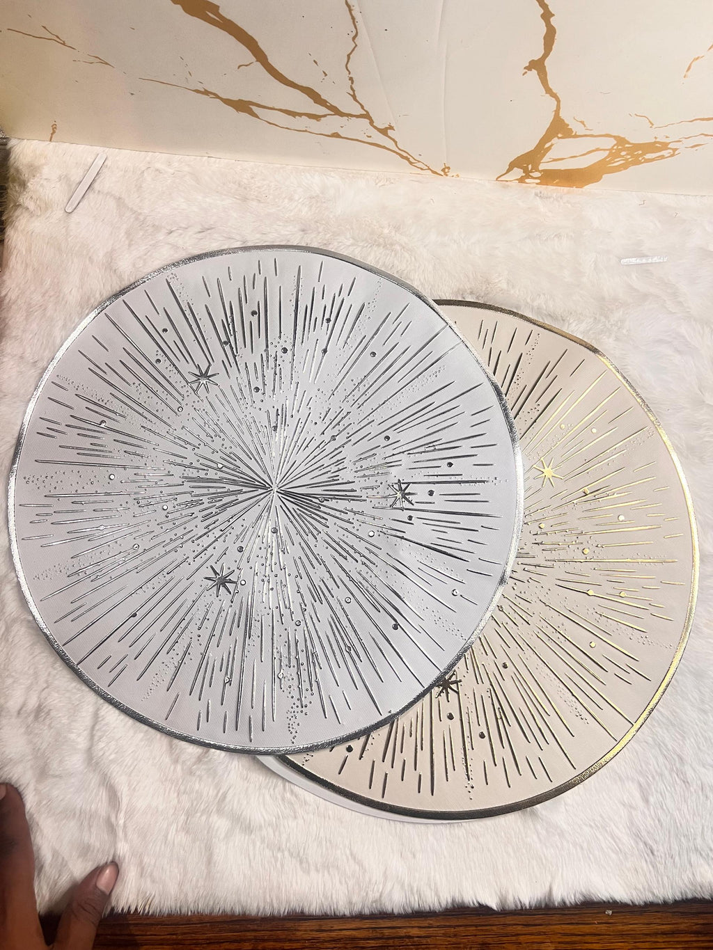 round decorative plates with starburst and star patterns