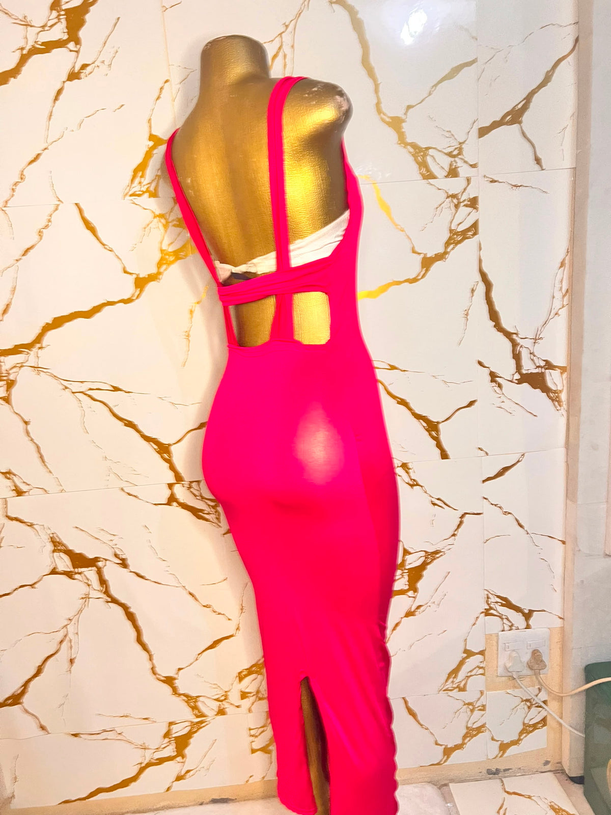A bright red sleeveless bodycon dress