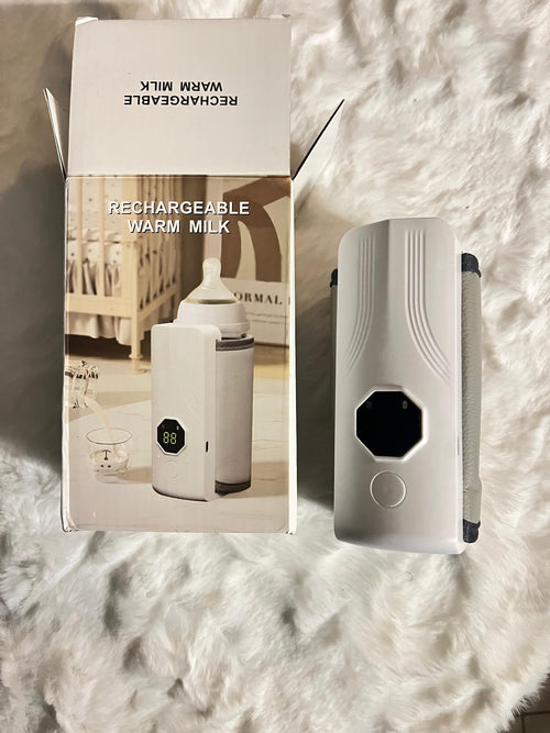 A white rechargeable warm milk bottle 