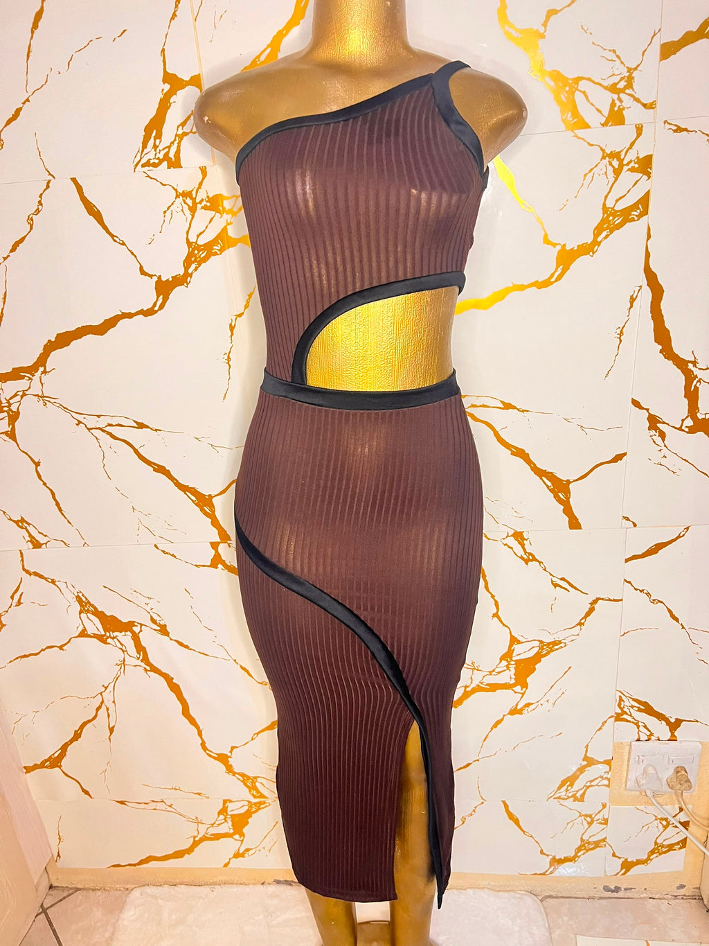 A one-shoulder ribbed mesh midi dress in dark brown with black trim