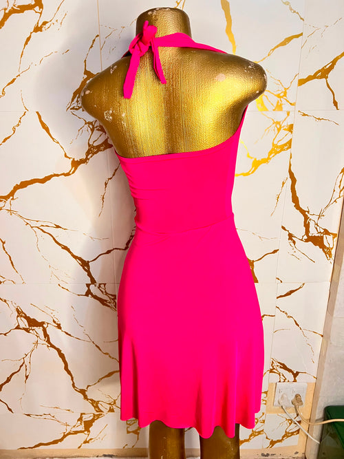 A bright pink sleeveless dress