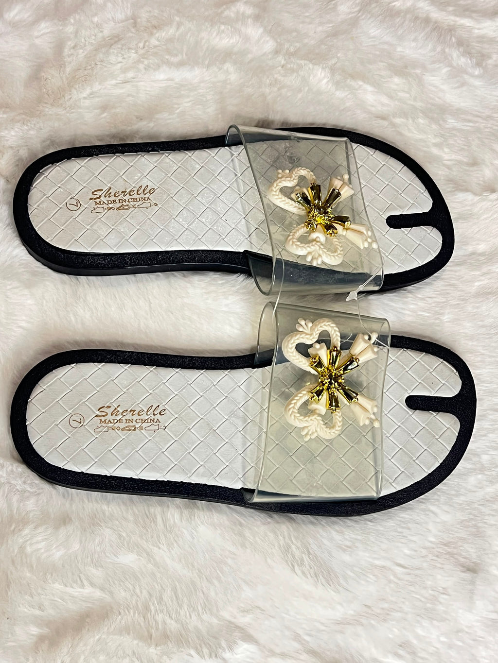 Slide sandals with clear mesh