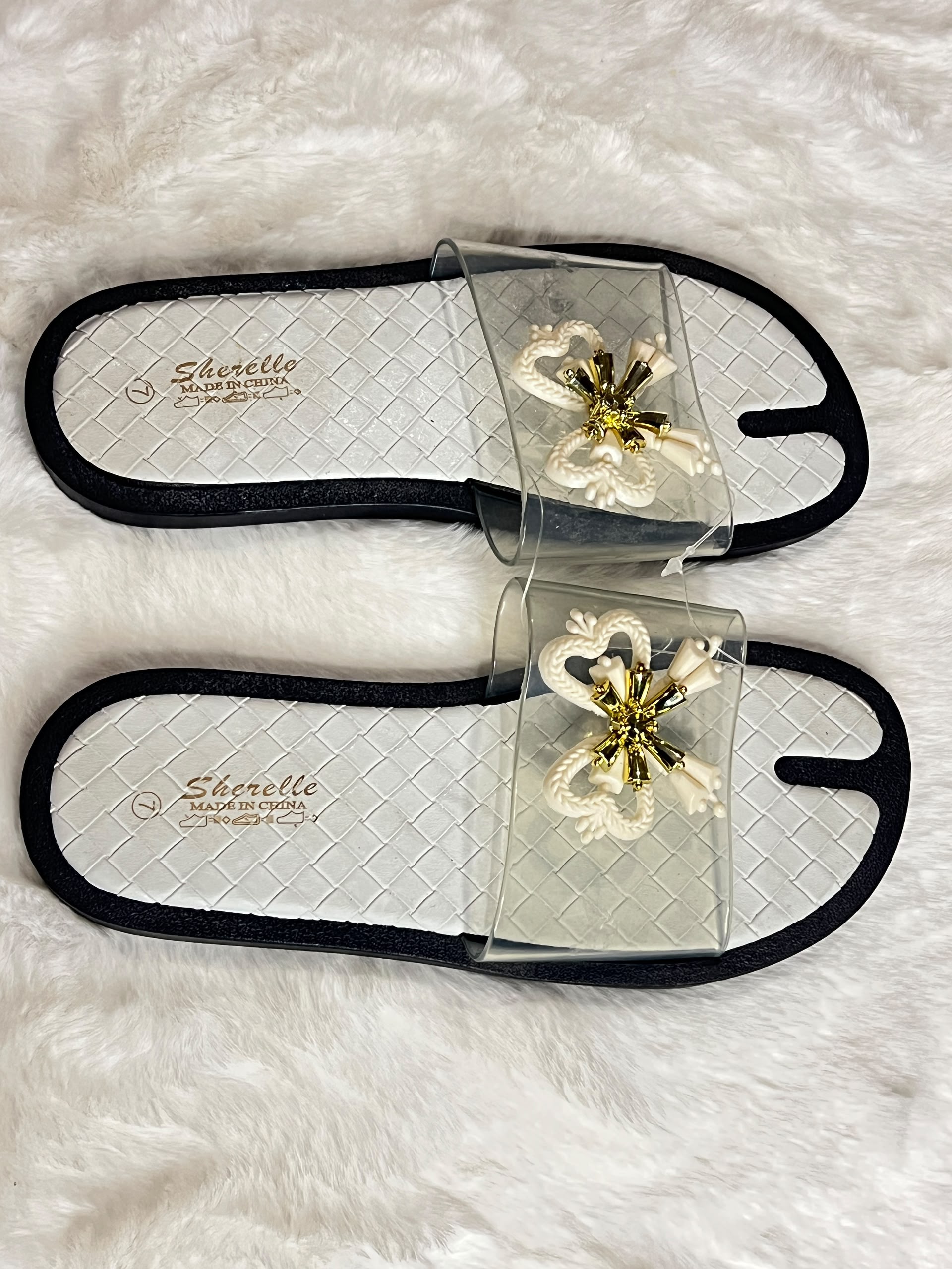 Slide sandals with clear mesh