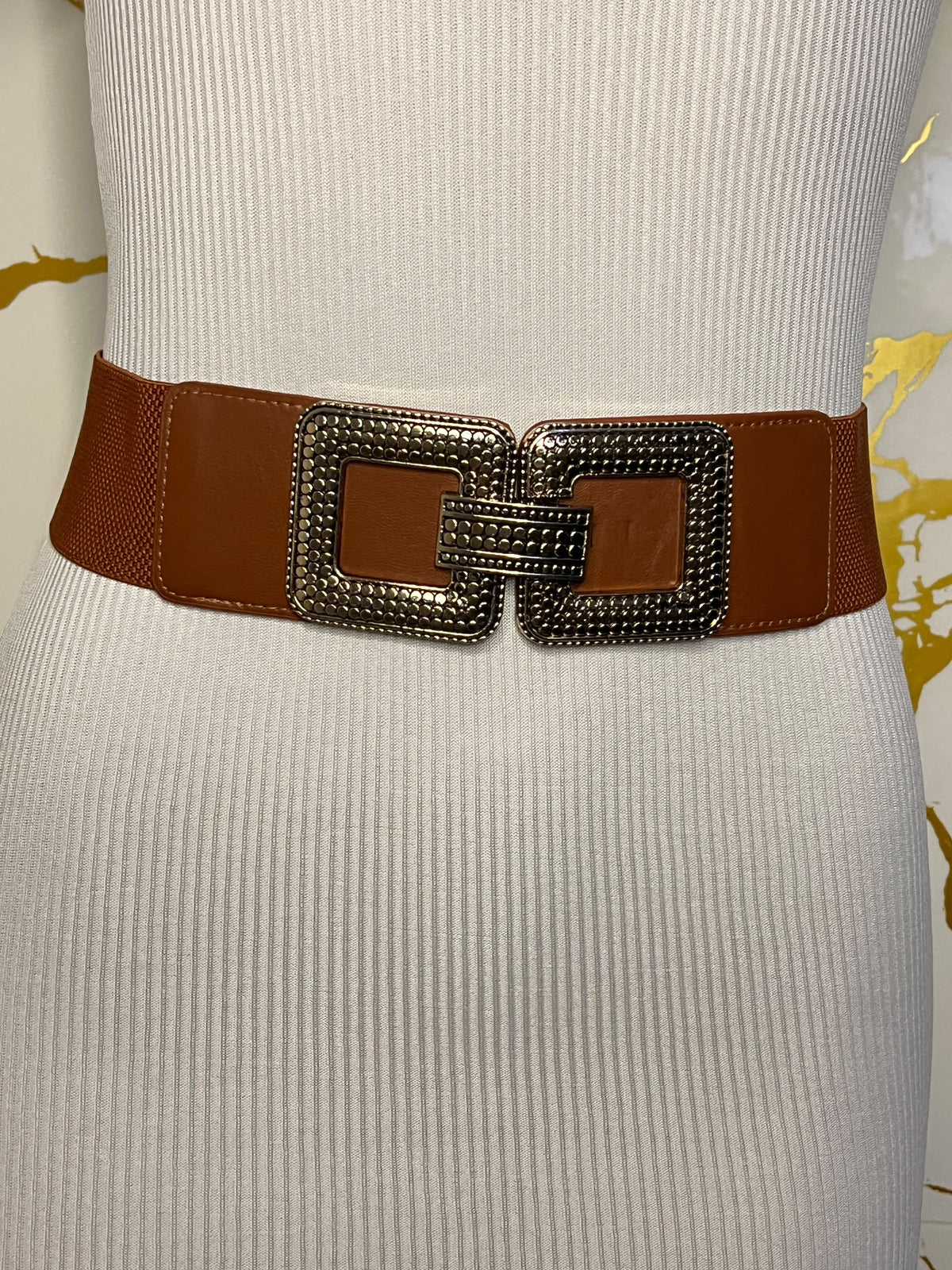 Brown wide belt with a large square buckle
