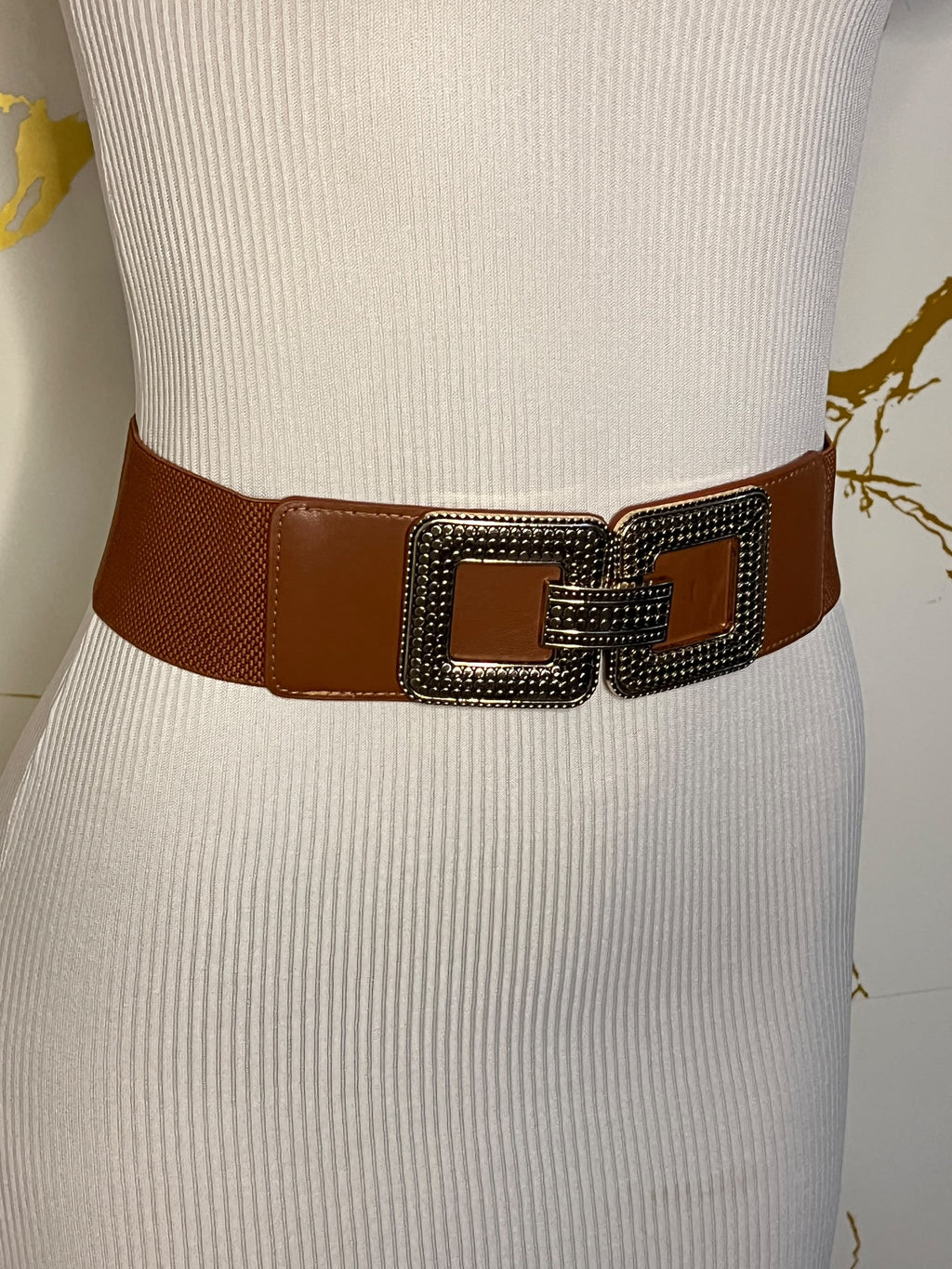 Brown wide belt with a large square buckle