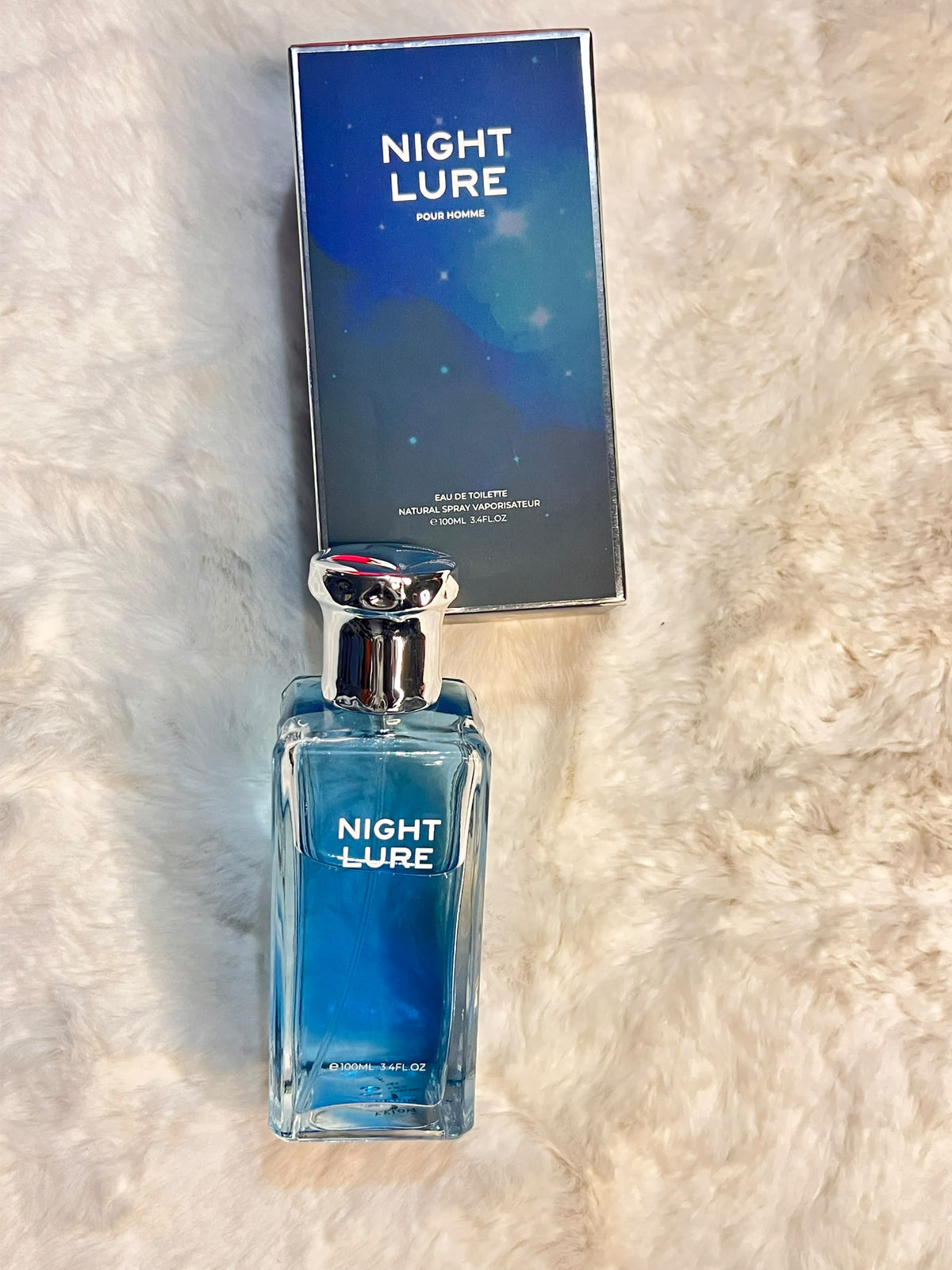 A bottle of Night Lure Eau de Toilette perfume