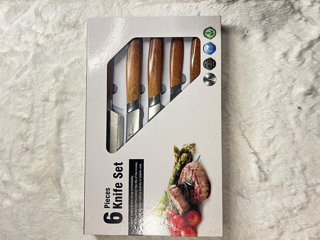 A 6-piece kitchen knife set with wooden handles and a black peeler