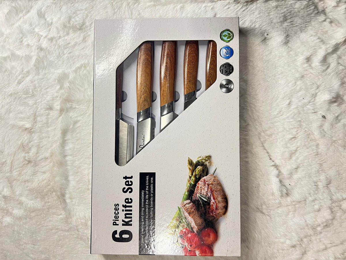 A 6-piece kitchen knife set with wooden handles and a black peeler