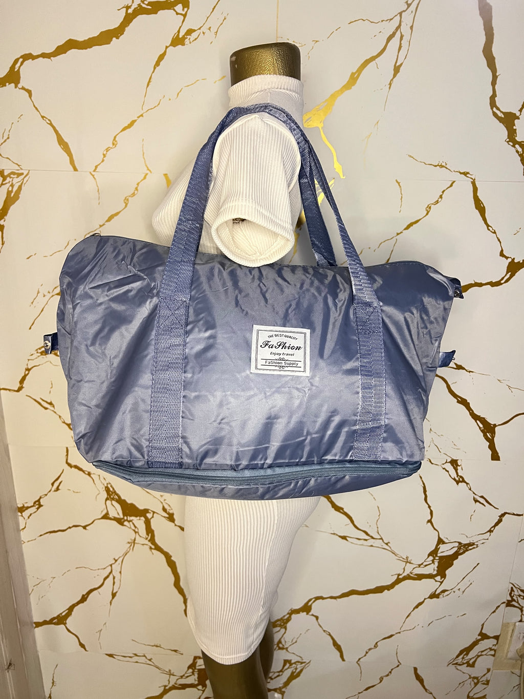  Blue travelling zippered duffel bag with dual shoulder straps