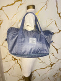  Blue travelling zippered duffel bag with dual shoulder straps
