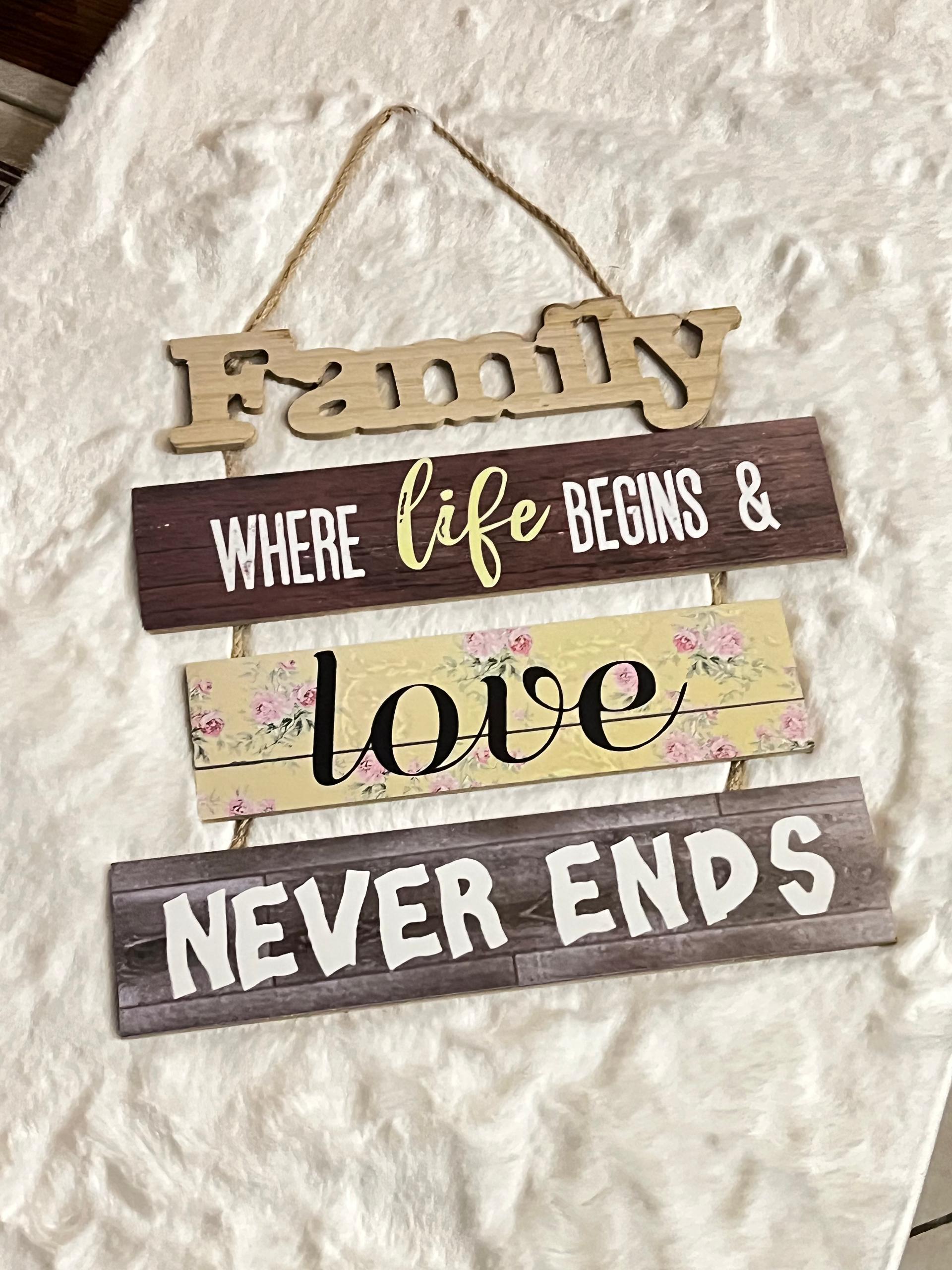 Rustic multi-tiered wooden hanging sign
