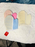 Four heart-shaped hand towels in pastel colors 