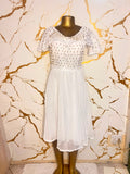 White short-sleeve midi dress with a sheer embroidered bodice and flared skirt