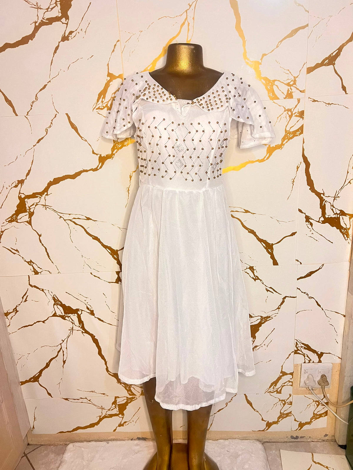 White short-sleeve midi dress with a sheer embroidered bodice and flared skirt