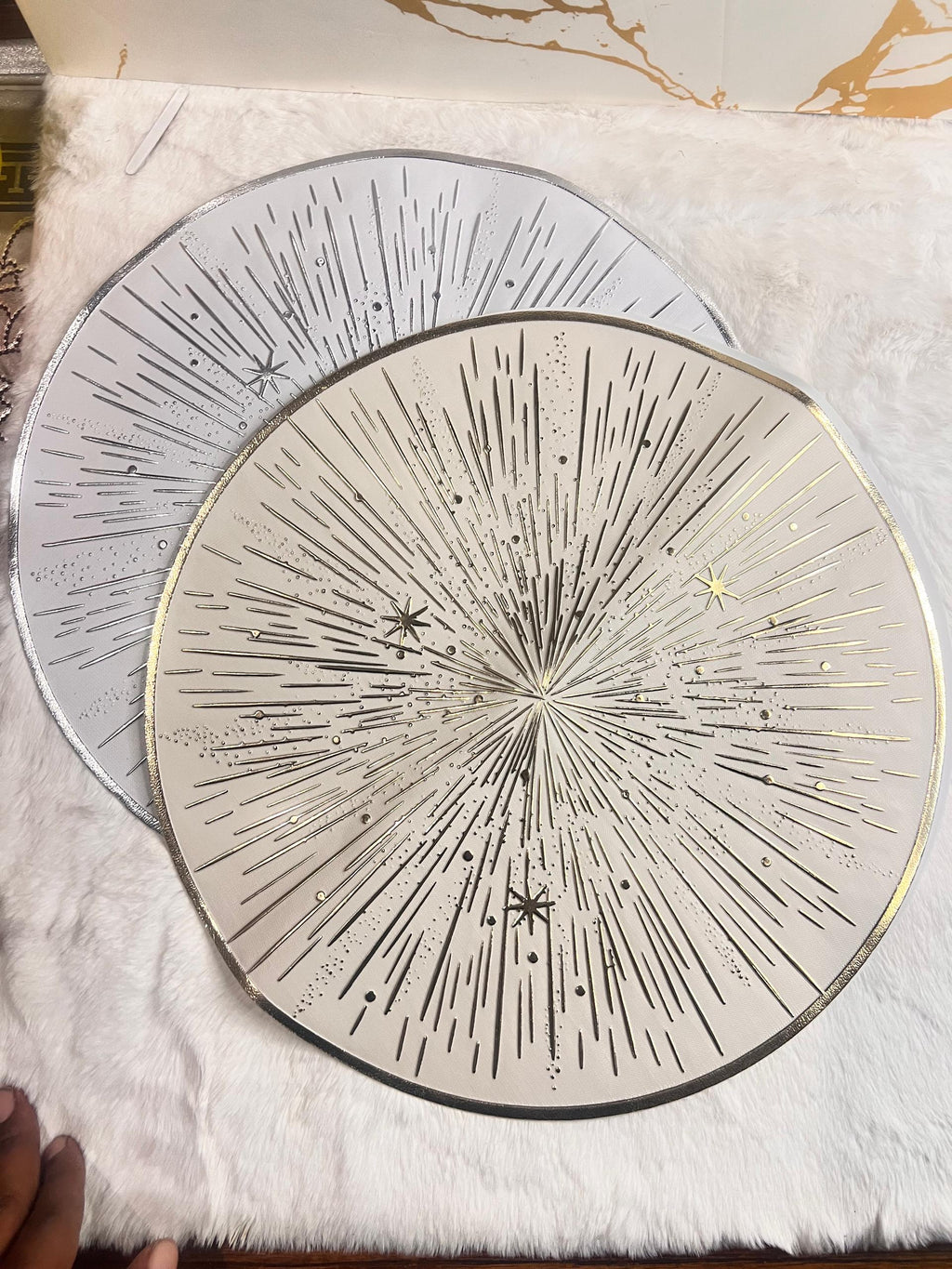 round decorative plates with starburst and star patterns