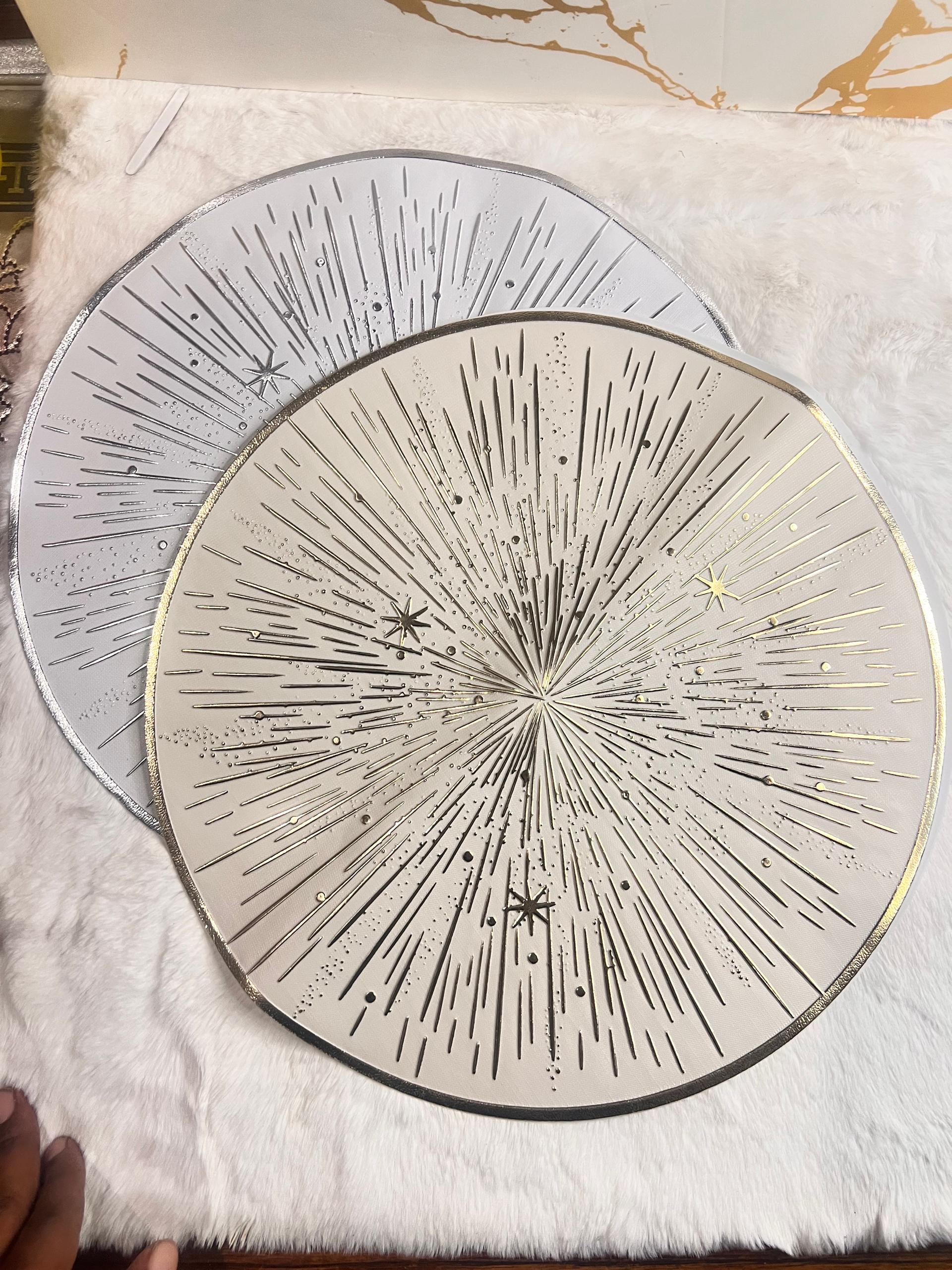 round decorative plates with starburst and star patterns