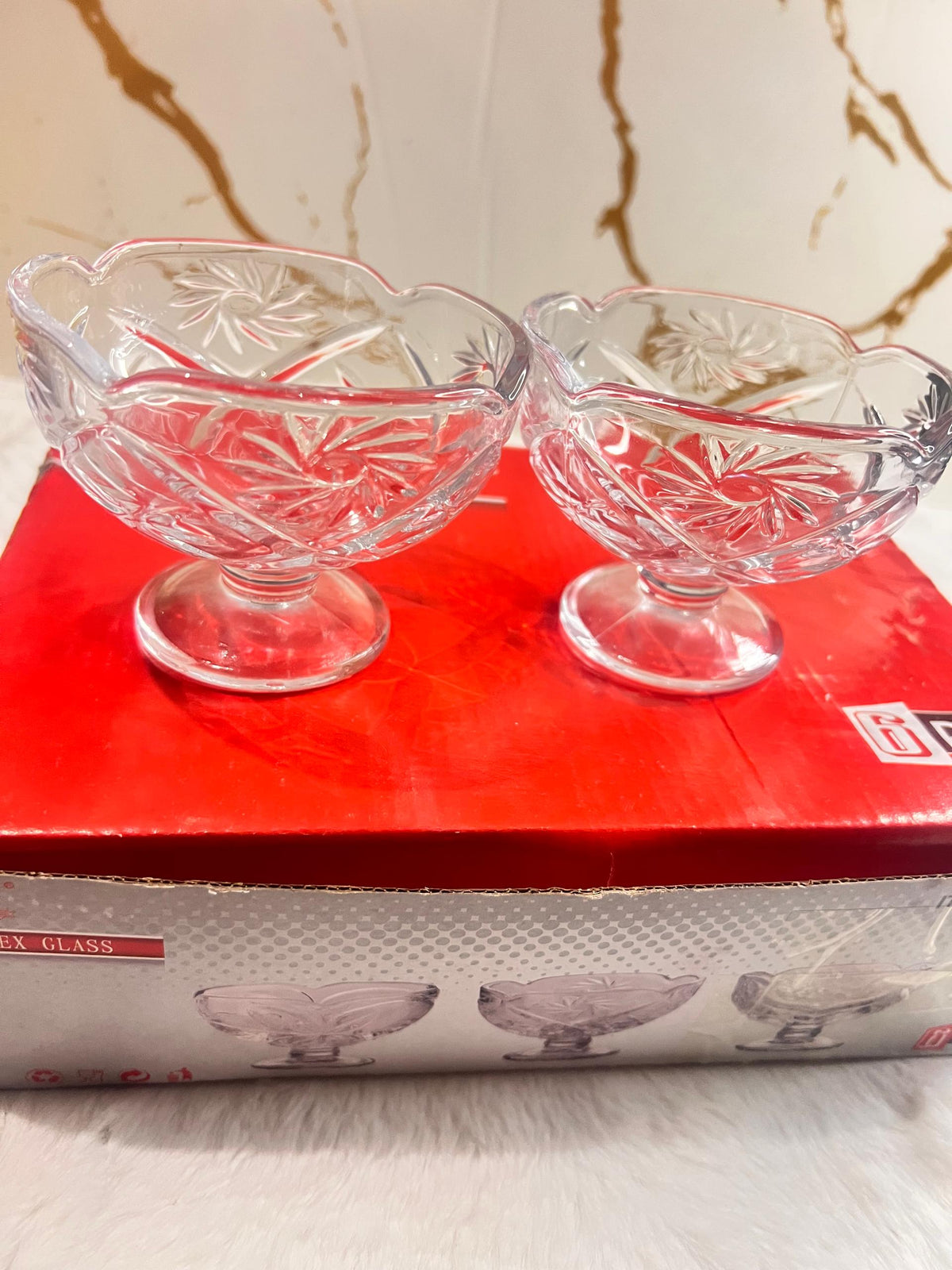 Two clear cut-crystal dessert or candy dishes with pedestal bases