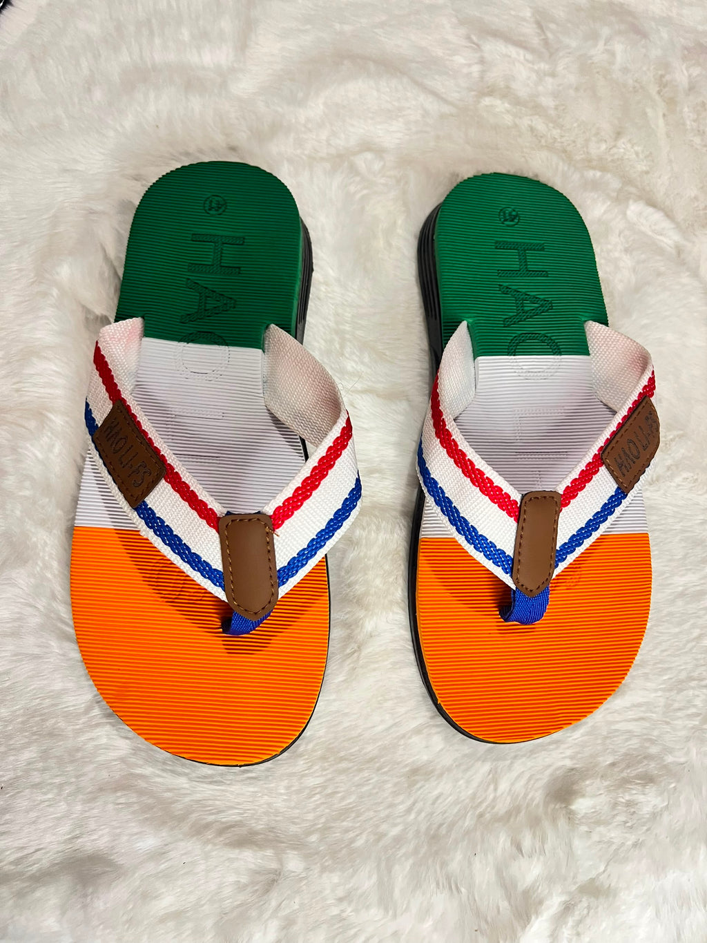 Hágás flip-flop sandals with a green, white, and orange