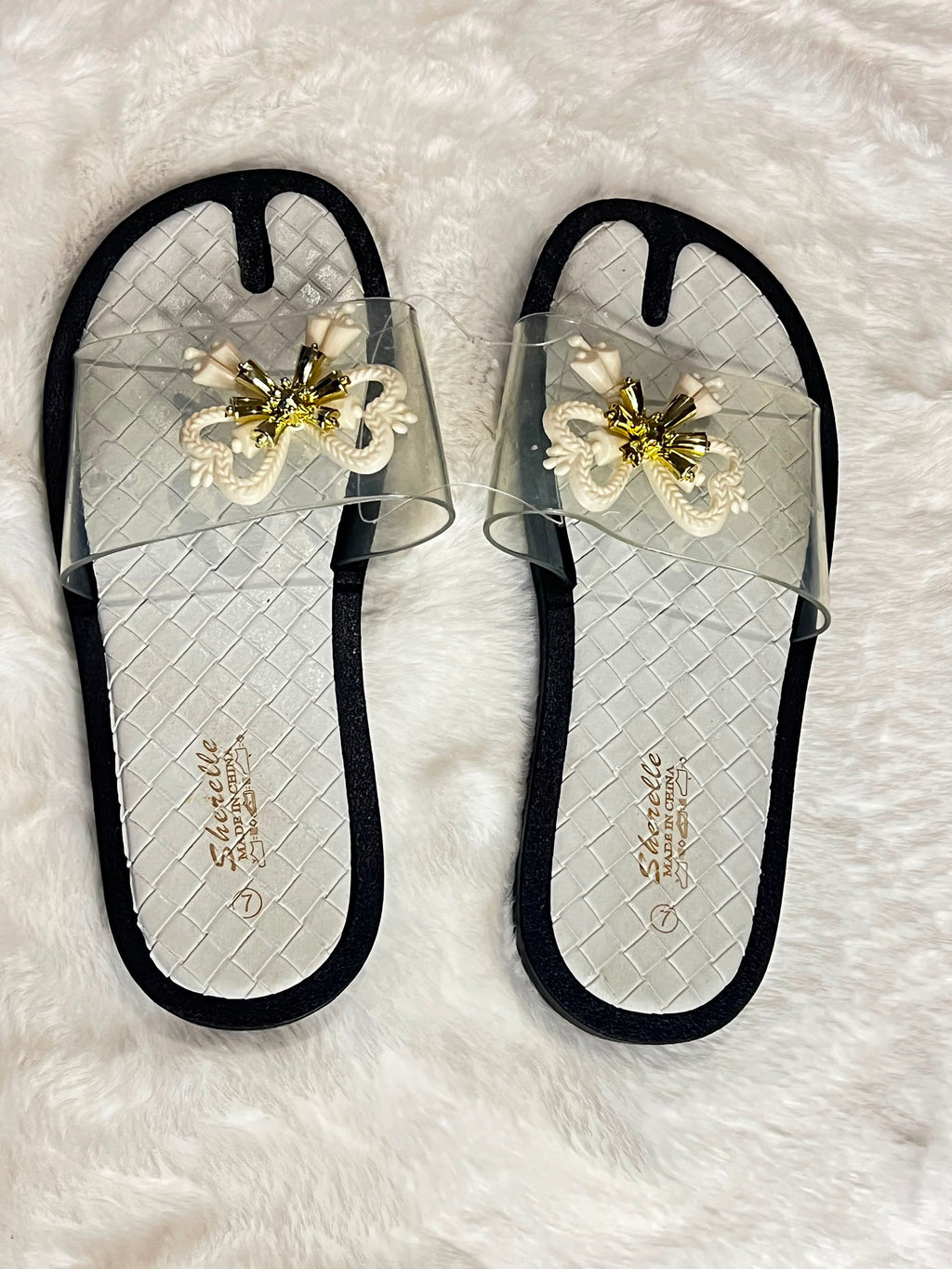 Slide sandals with clear mesh