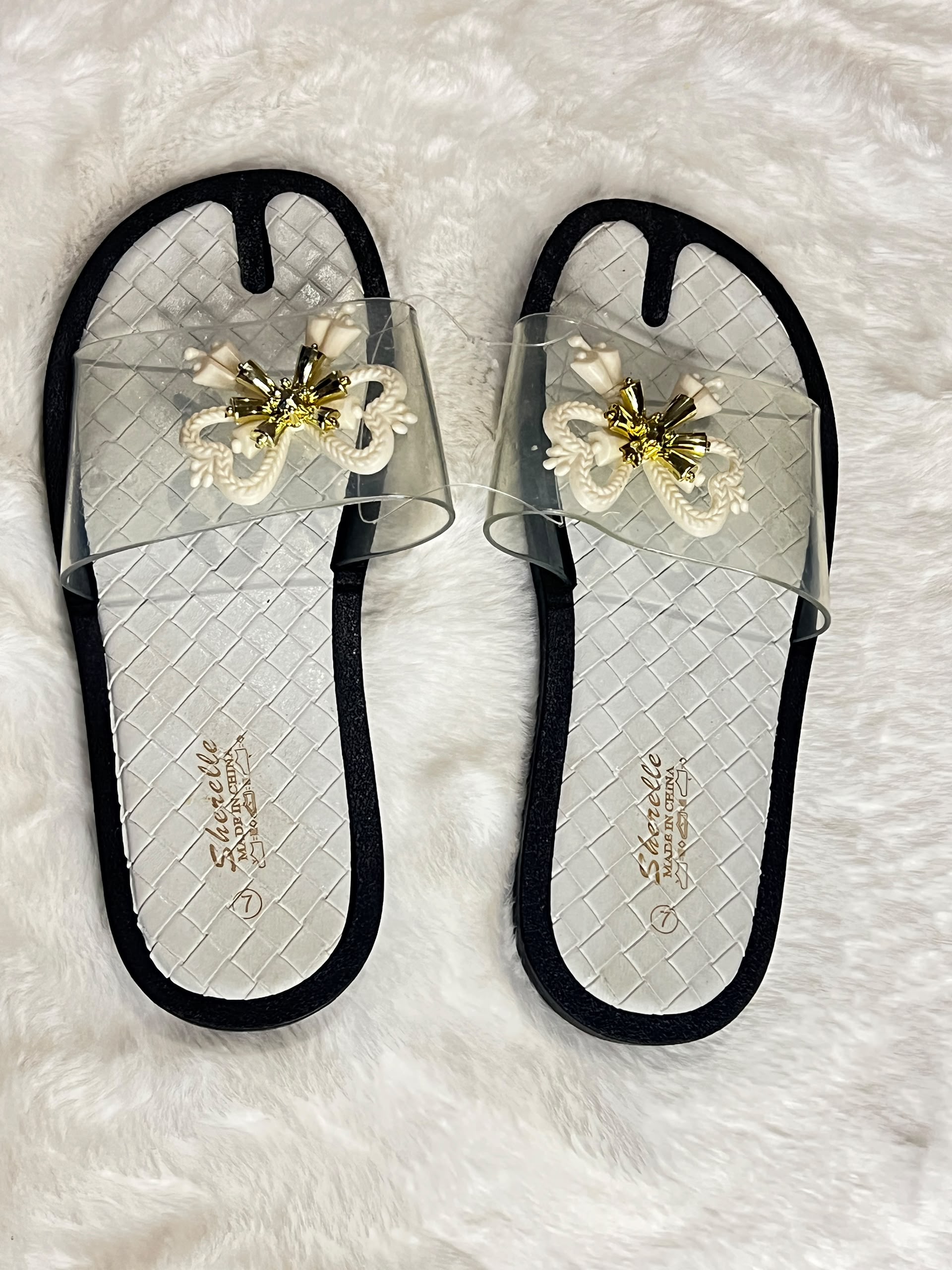 Slide sandals with clear mesh
