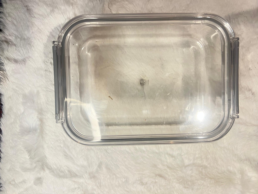 Set of four large clear plastic storage containers with gray lids