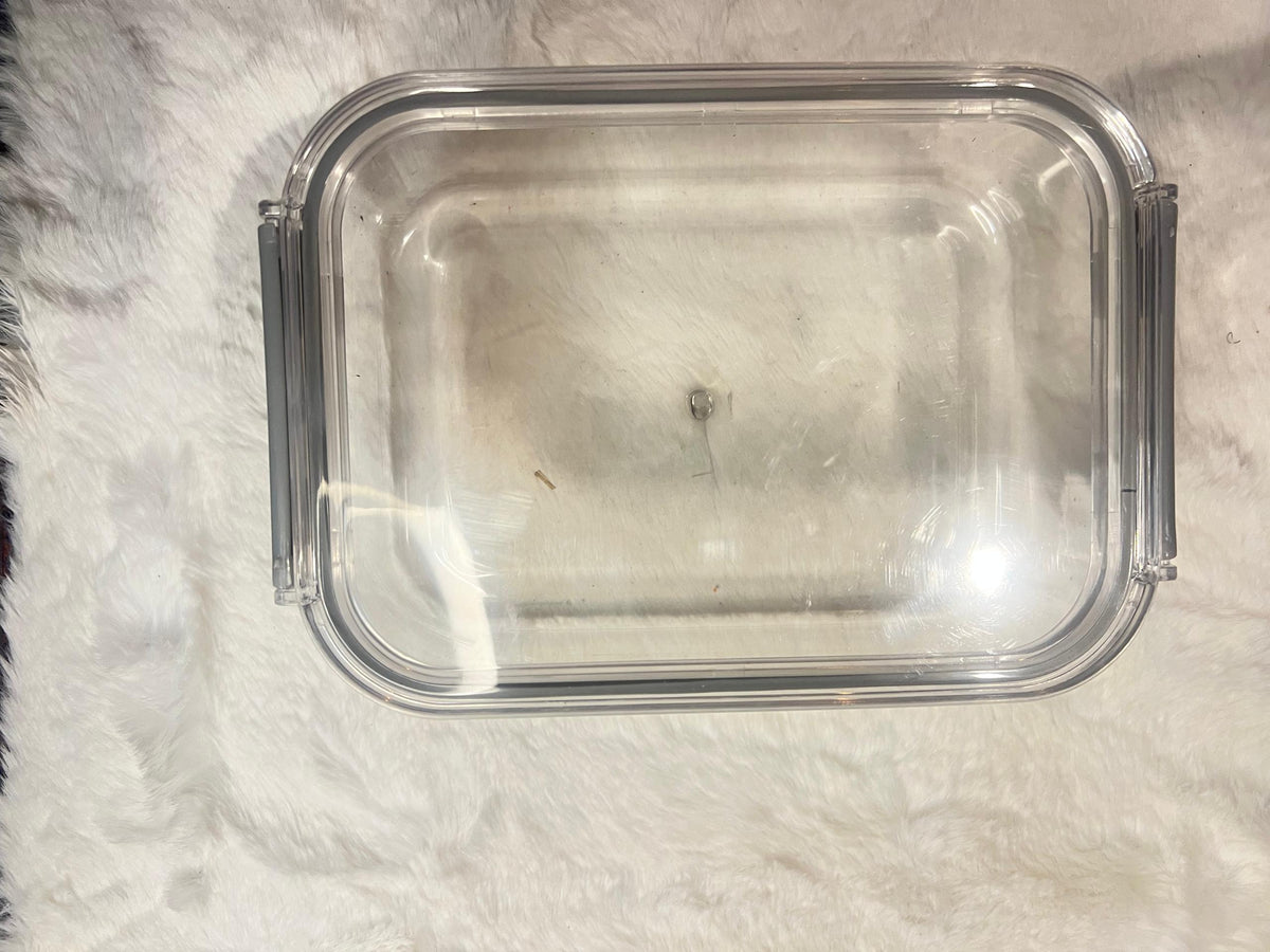 Set of four large clear plastic storage containers with gray lids