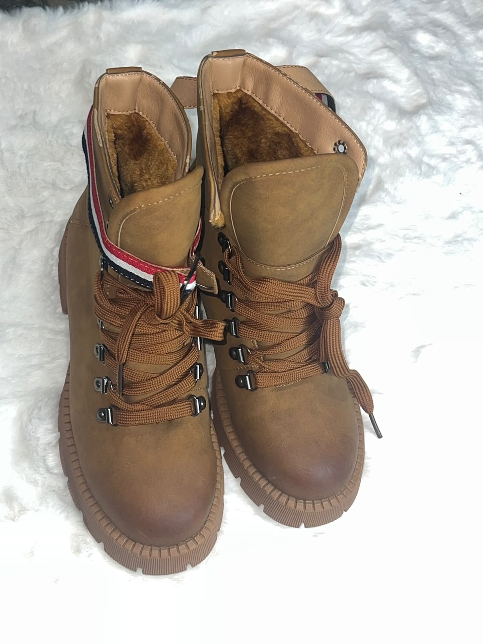 brown suede lace-up ankle boot with a thick lug sol