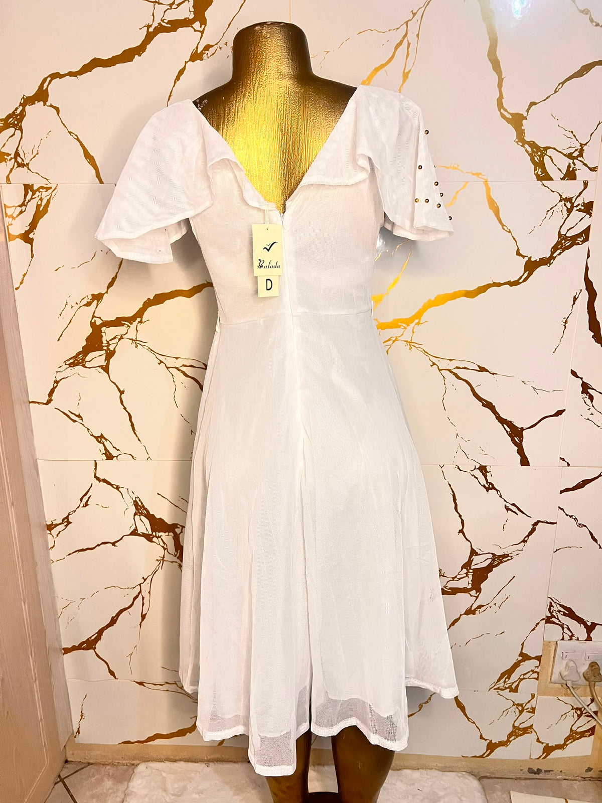 White short-sleeve midi dress with a sheer embroidered bodice and flared skirt