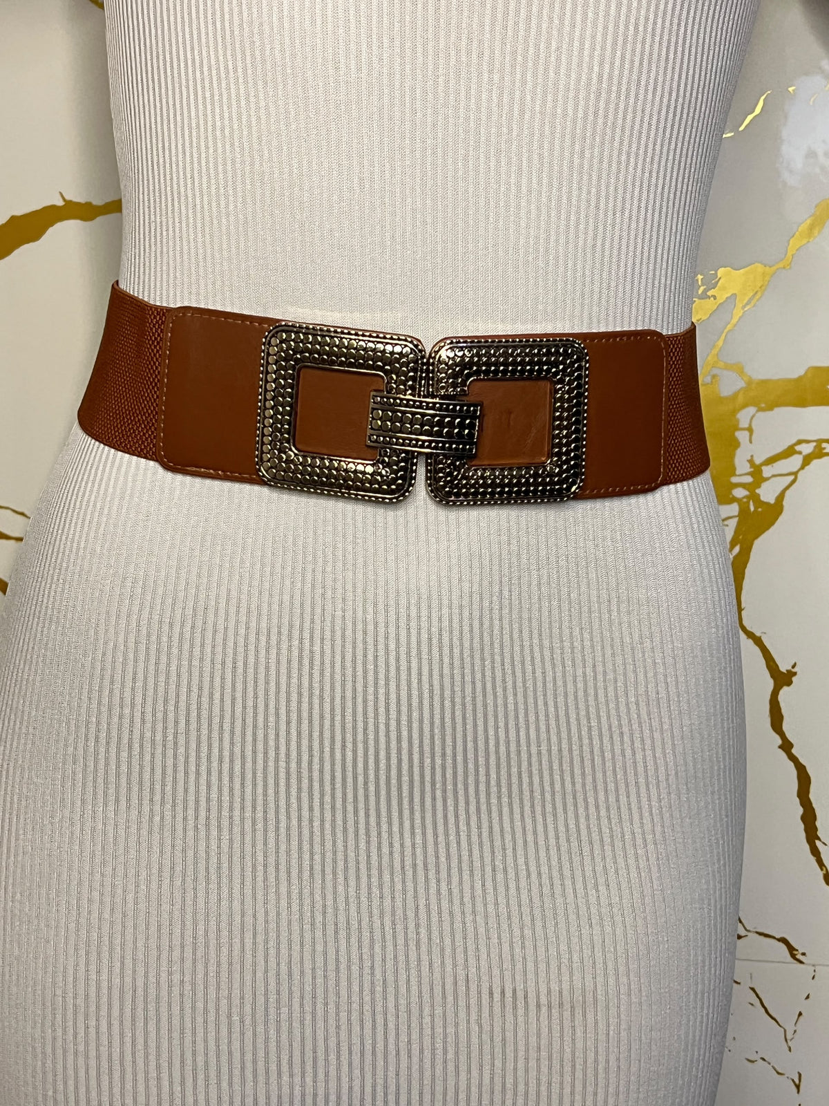 Brown wide belt with a large square buckle