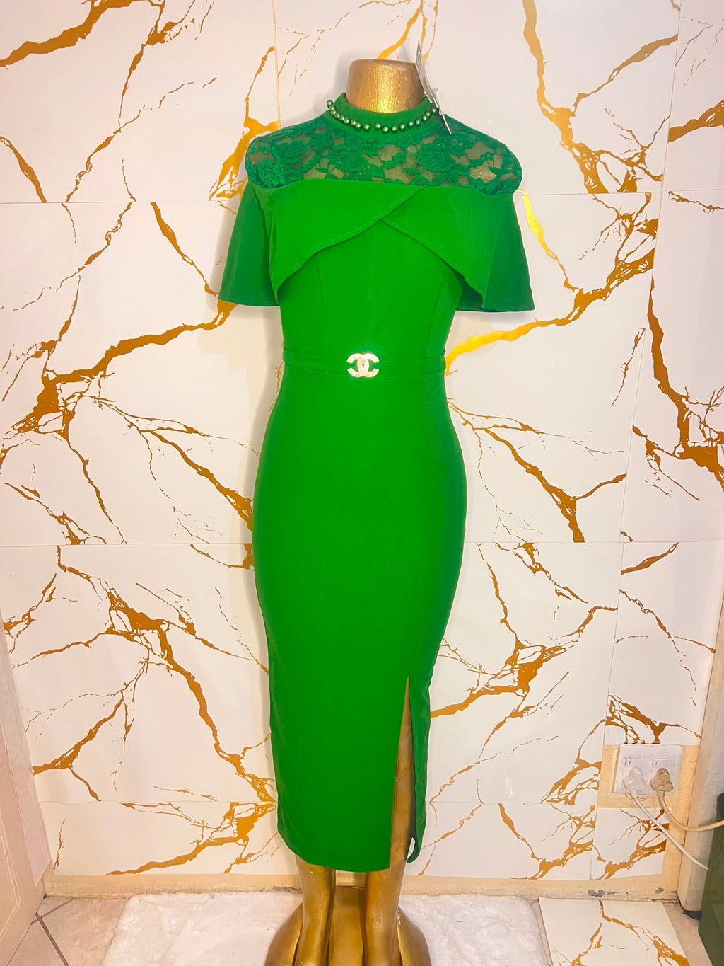 A bright green midi dress