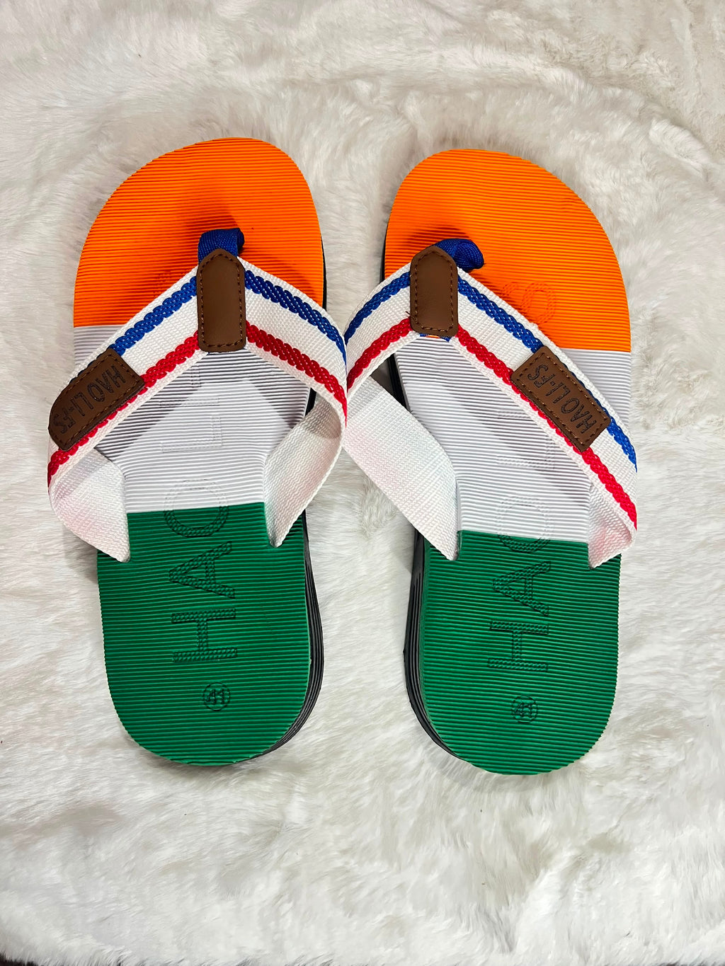 Hágás flip-flop sandals with a green, white, and orange
