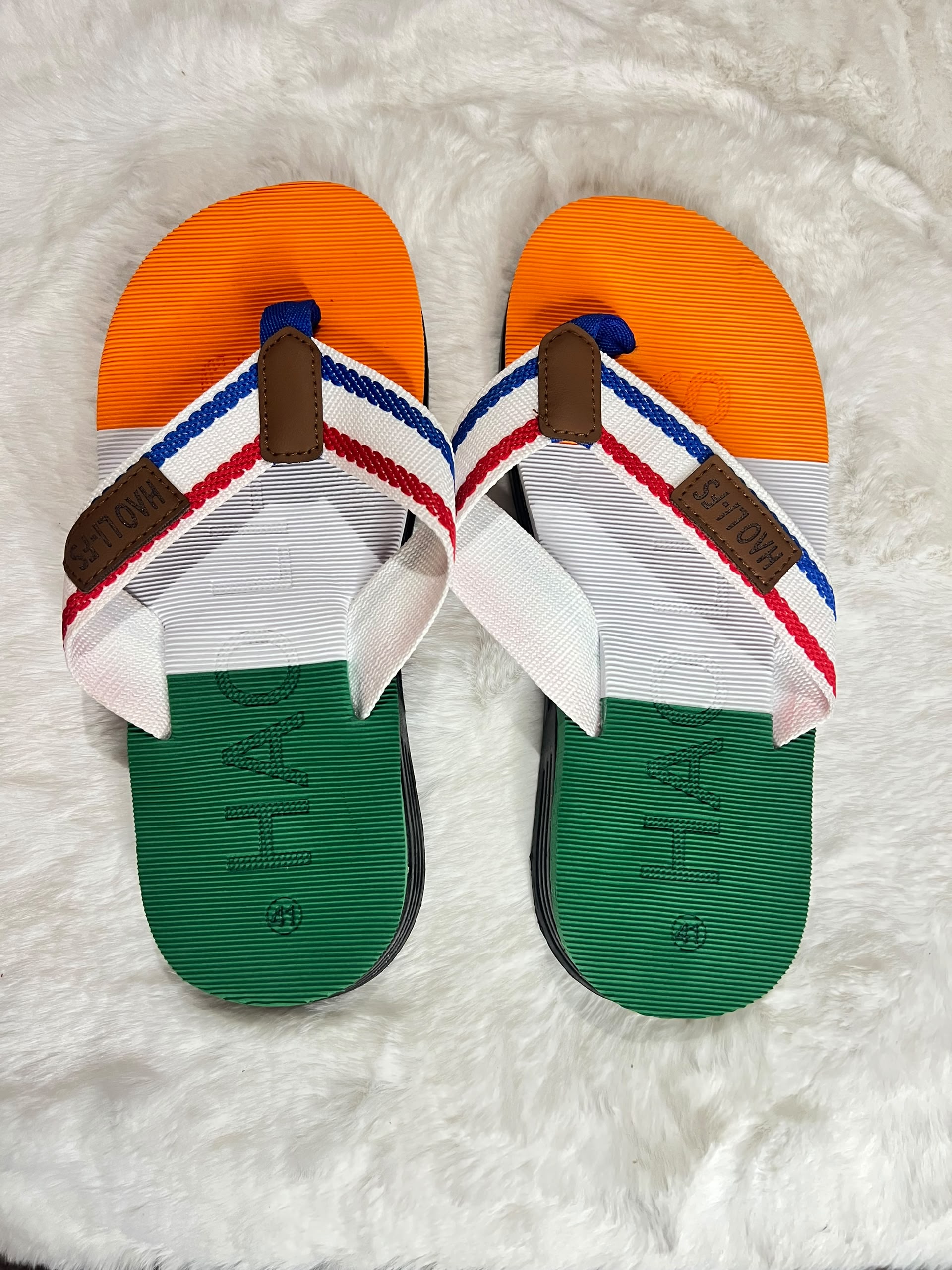 Hágás flip-flop sandals with a green, white, and orange