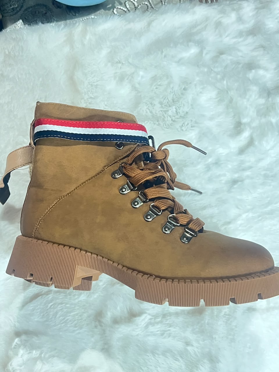 brown suede lace-up ankle boot with a thick lug sol